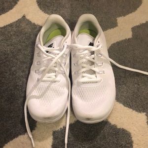 White nike free runs.